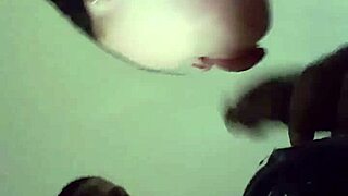 Cleveland girl enjoys BBC while husband watches.