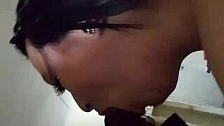 Cleveland girl enjoys BBC while husband watches.