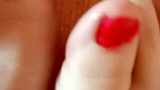 greta puts nail polish on her toenails