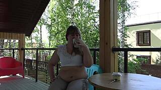 Chubby milf eats outdoors fetishistically