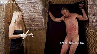 Cruel blonde milf whips guys cock in brutal femdom session