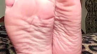 foot goddess hypnotizes subs with bare feet