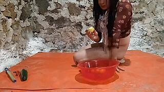 TS Pee in Ass and Fruit Play Stretches Gaping Hole with Cucumber in Toilet