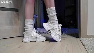 A british teen's delicate legs in sneakers wait in the shower for your touch