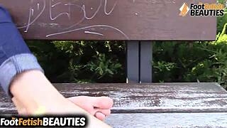 Brunette Babe Goes Barefoot in Park