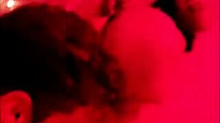 Chubby Brunette Sits On Big Cock Under Red Light