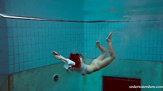 babe lola swims underwater with big natural tits 😍