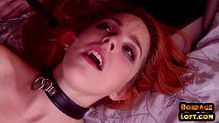 Bound redhead nipple clamped and zapped in kinky threesome domination.