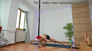 christmas mood flexing pole dancing exercising in gym