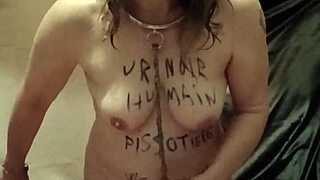In 2025, a housewife slave endures humiliation as a human urinal for her master