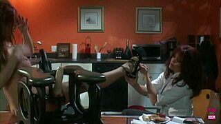 The Heartfelt Moment When A Redheaded Babe Makes Another Lady With Big Breasts Eat Cakes And Fruit