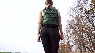 Milf in black tights walks and teases her nice butt