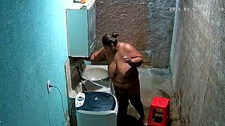 hidden camera catches stepmother shaving while stepson watches secretly.