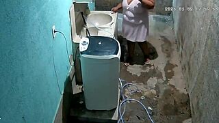 hidden camera catches stepmother shaving while stepson watches secretly.