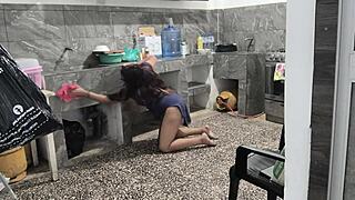 My stepsister got stuck in the kitchen while cleaning, I helped her and filmed her brown buttocks