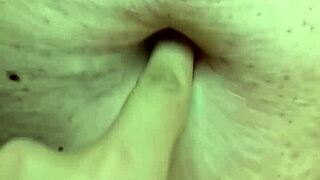 Exploring a milf's navel during a relaxing massage session