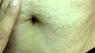 Exploring a milf's navel during a relaxing massage session