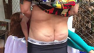 Deceptive doll endures anal toy play outdoors