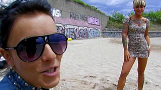 Short-haired tattooed MILF engages in intense beach fucking with anal and creampie