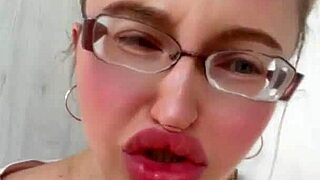 blonde with glasses and lipstick, huge fetish vibes in this long-haired russian scene