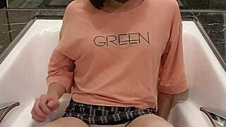 Shemale Ting Xuan Bathes In Bathtub Wearing Clothes