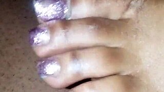 In this scene, soft toes playfully tease a throbbing dick