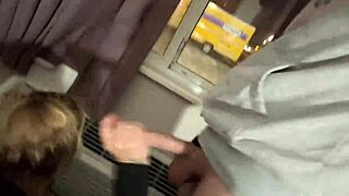 blowjob performed in the hotel window