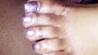 In this scene, soft toes playfully tease a throbbing dick