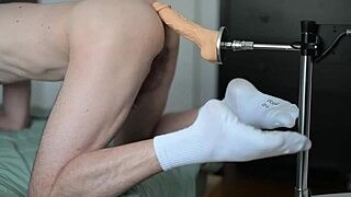 gay guy with socks using his machine
