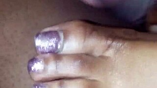 In this scene, soft toes playfully tease a throbbing dick