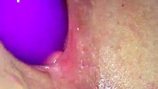 The lesbian wet wife masturbates casually in her room