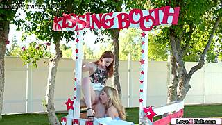 Blonde babe is rimmed in a kissing booth