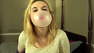 Fifi Foxx BLOWS big Hubba Bubba bubbles with gum