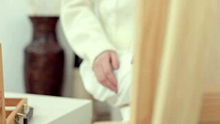 Petite Asian babe Kwini Kim fucks muscular guy in hardcore session. Includes blowjob, doggystyle, and cumshot.