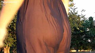 hairy mature flashes pussy in see-through outdoors