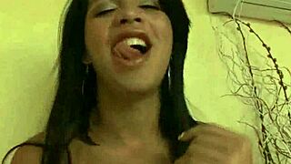 Foxy brunette tranny tugs hard cock