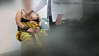 doctor examines patient in clinic setting