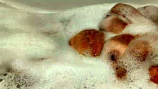 Tanned Stepsister's Big Tits Tease In Bathroom