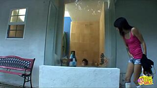 Hot brunette surprises friend in bathtub dives into wet pussy!