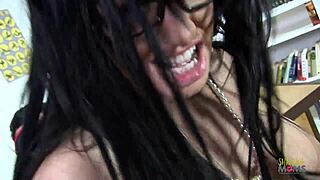 A blindfolded student receives attention from brunette milf teacher with big tits before doggy style