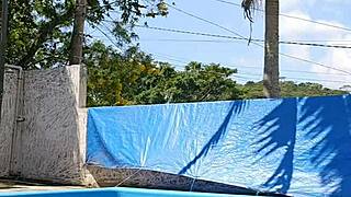 young wife flashes huge ass in tight bodysuit by pool as husband watches silently