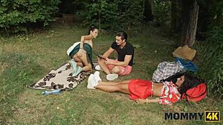 Horny milf sneaks young cock fuck on grass while cuckold watches