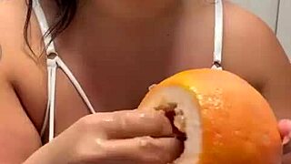 curvy bbw tattooed beauty teases fat ass with fruit fetish