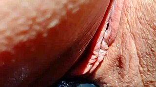 mature blonde grinds shaved wet pussy close up moaning legs spread.