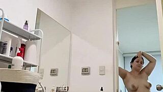 Whoa, Nicole's plump ass and perky tits glisten under the shower spray!