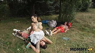 Horny milf sneaks young cock fuck on grass while cuckold watches