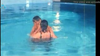 unmarried couple chills by the pool on their wedding day vibes
