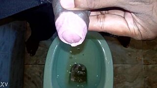 black boy pisses wildly as man urinates on him in raw peeing frenzy