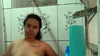 Latina brunette pornstar bathes showing off wet big ass natural tits pussy