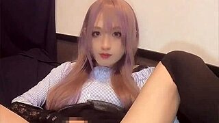 Pink-haired crossdresser vibes anal while stroking hard?